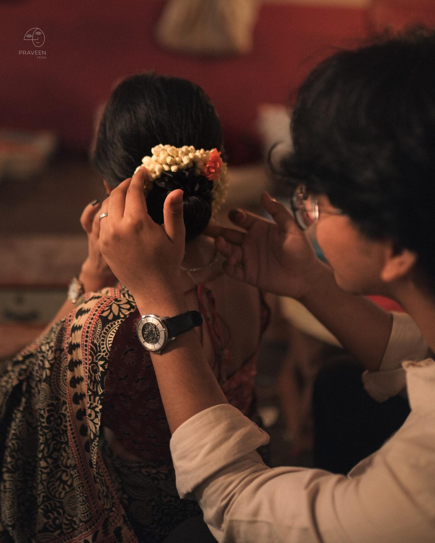 Pratushya laughing in the lamplight